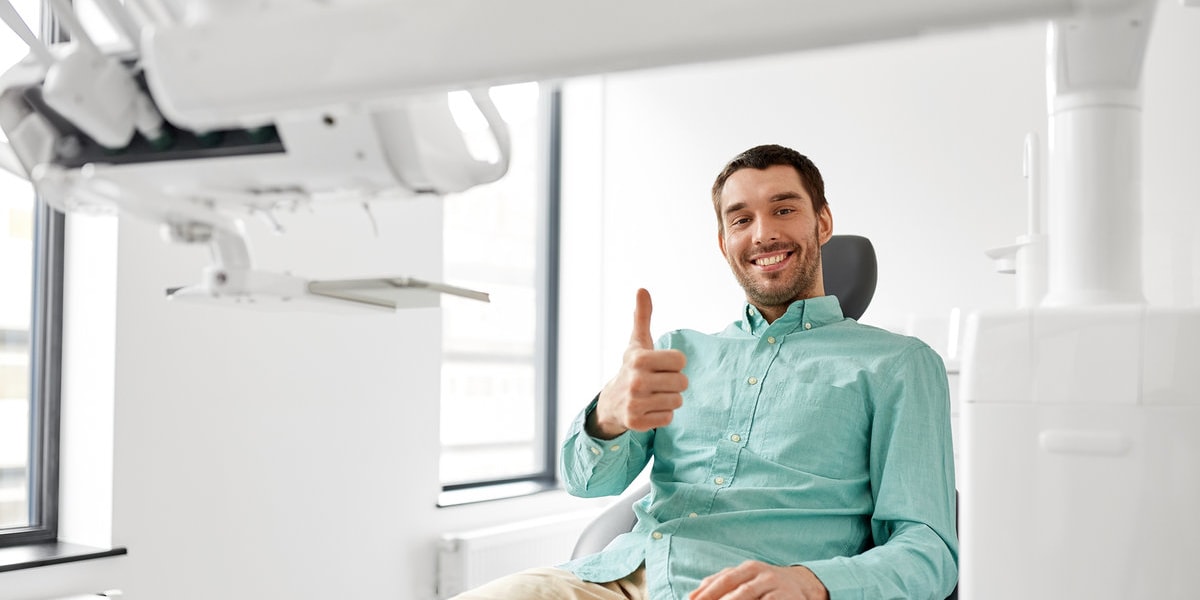 man thumbs up sign-sedation dentistry-wortley road dental